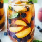 Peach Sangria with Blueberries, Basil and Rose for Summer Bliss 15 Peach Sangria with Blueberries, Basil and Rose