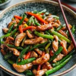 Savory Garlic Scape Stir Fry with Pork for Quick Dinners 6 Garlic Scape Stir Fry with Pork (蒜苔炒肉丝)