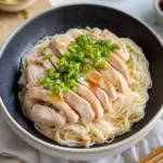 Hainanese Chicken Noodles: Comforting Ginger-Scallion Bliss 10 Hainanese Chicken Noodles (Ginger-Scallion Steamed Chicken Noodles)